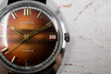 Vintage Soviet mechanical men's watch VOSTOK 2414.A, red dial