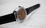 Vintage Soviet mechanical men's watch VOSTOK 2414.A, red dial