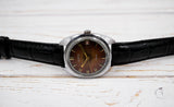 Vintage Soviet mechanical men's watch VOSTOK 2414.A, red dial