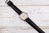 Retro mechanical wristwatch Poljot watch 2614.2H with date indicator