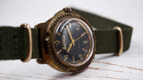 Vintage soviet mechanical men's watch VOSTOK, black dial, brass case