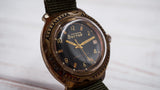 Vintage soviet mechanical men's watch VOSTOK, black dial, brass case