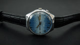 Vintage RAKETA 2628 college calendar Soviet mechanical wristwatch