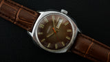 Vintage RAKETA 2627.H Soviet mechanical wristwatch date/day indicator