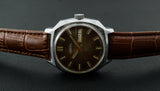 Vintage RAKETA 2627.H Soviet mechanical wristwatch date/day indicator