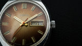 Vintage RAKETA 2627.H Soviet mechanical wristwatch date/day indicator