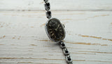 Vintage Soviet womens mechanical watch Luch 1801.1, black dial