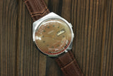 Soviet vintage mechanical wristwatch Raketa (Rocket), college calendar watch